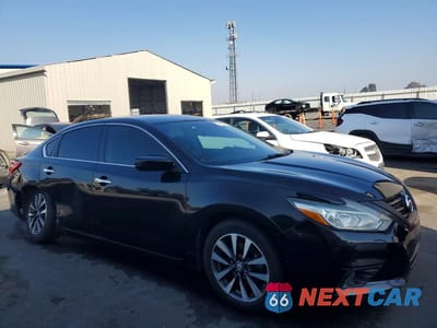 Czwarte zdjęcie samochodu z boku: 2017 NISSAN ALTIMA 2.5 VIN:1N4AL3AP0HC118509 - miniatura
