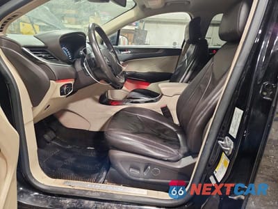 Zdjęcie 7 z 13 samochodu: 2017 LINCOLN MKC RESERVE VIN:5LMTJ3DH2HUL44227 - miniatura