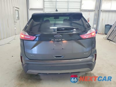 Zdjęcie 6 z 14 samochodu: 2023 FORD EDGE SEL VIN:2FMPK4J96PBA21145 - miniatura
