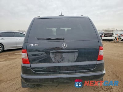 Zdjęcie 6 z 13 samochodu: 2003 MERCEDES-BENZ ML 350 VIN:4JGAB57E03A431297 - miniatura
