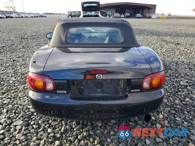 Zdjęcie 6 z 11 samochodu: 1999 MAZDA MX-5 MIATA VIN:JM1NB3537X0109120 - miniatura