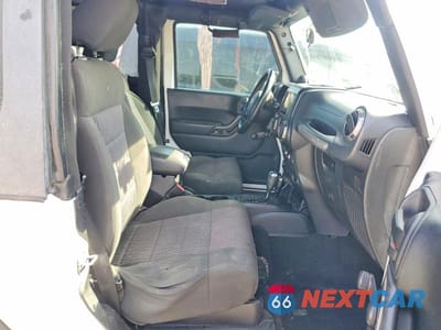 Zdjęcie 11 z 14 samochodu: 2011 JEEP WRANGLER VIN:1J4AA2D11BL607875 - miniatura