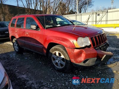 Czwarte zdjęcie samochodu z boku: 2009 JEEP GRAND CHEROKEE LAREDO VIN:1J8GR48K49C543258 - miniatura