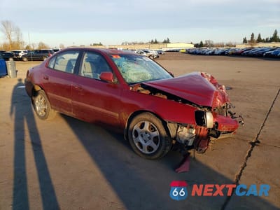 Czwarte zdjęcie samochodu z boku: 2002 HYUNDAI ELANTRA VIN:KMHDN45D12U440826 - miniatura