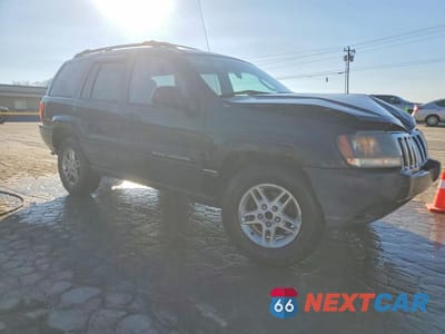 Czwarte zdjęcie samochodu z boku: 2003 JEEP GRAND CHEROKEE LAREDO VIN:1J4GW48S73C506707 - miniatura