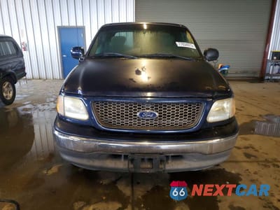 Piąte zdjęcie samochodu w środku: 2003 FORD F150 VIN:1FTRX17W13NA90074 - miniatura