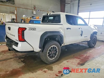 Trzecie zdjęcie samochodu z tyłu: 2024 TOYOTA TACOMA TRD OFF-ROAD HV VIN:3TYLC5LN9RT001610 - miniatura