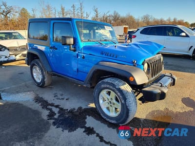 Czwarte zdjęcie samochodu z boku: 2016 JEEP WRANGLER SPORT VIN:1C4AJWAG2GL165802 - miniatura