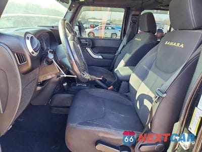 Zdjęcie 7 z 13 samochodu: 2013 JEEP WRANGLER UNLIMITED SAHARA VIN:1C4BJWEG1DL519464 - miniatura