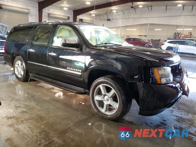 Czwarte zdjęcie samochodu z boku: 2012 CHEVROLET SUBURBAN K1500 LTZ VIN:1GNSKKE7XCR110985 - miniatura