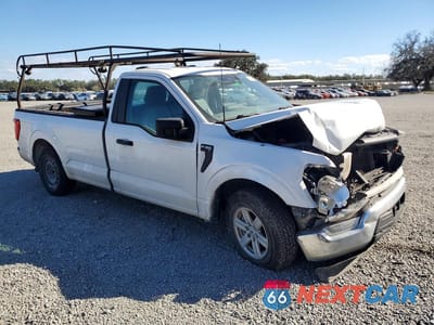 Czwarte zdjęcie samochodu z boku: 2022 FORD F150 VIN:1FTMF1CP3NKE13184 - miniatura