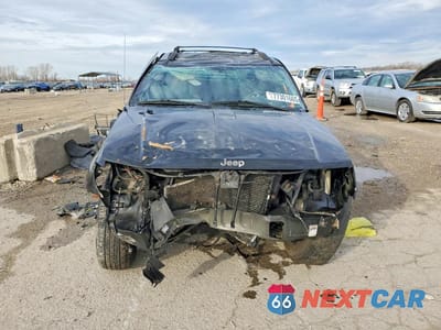 Piąte zdjęcie samochodu w środku: 2001 JEEP GRAND CHEROKEE LAREDO VIN:1J4GW48S61C694679 - miniatura