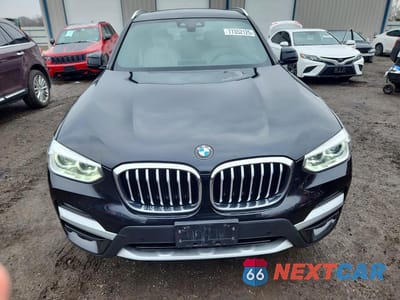 Piąte zdjęcie samochodu w środku: 2021 BMW X3 XDRIVE30E VIN:5UXTS1C04M9D71416 - miniatura