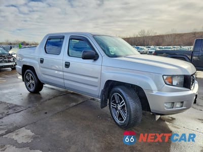 Czwarte zdjęcie samochodu z boku: 2014 HONDA RIDGELINE SPORT VIN:5FPYK1F75EB006836 - miniatura