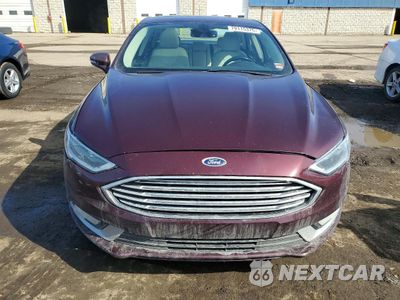 Piąte zdjęcie samochodu w środku: 2017 FORD FUSION TITANIUM HEV VIN:3FA6P0RU3HR394512 - miniatura