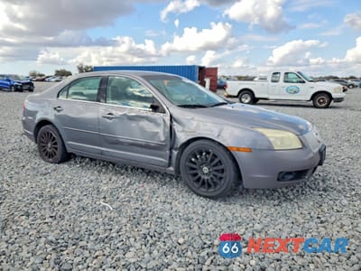 Czwarte zdjęcie samochodu z boku: 2006 MERCURY MILAN PREMIER VIN:3MEFM08196R616184 - miniatura