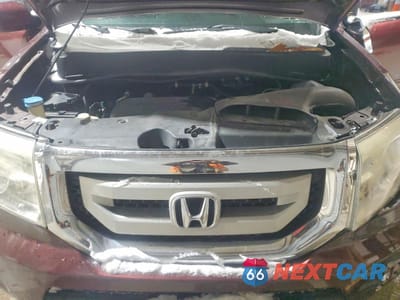 Zdjęcie 12 z 13 samochodu: 2011 HONDA PILOT EXL VIN:5FNYF4H68BB015500 - miniatura