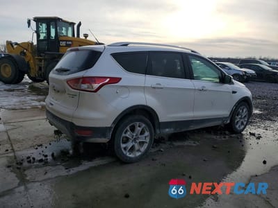 Trzecie zdjęcie samochodu z tyłu: 2016 FORD ESCAPE TITANIUM VIN:1FMCU9J94GUC42484 - miniatura