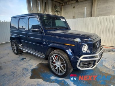 Czwarte zdjęcie samochodu z boku: 2023 MERCEDES-BENZ G 63 AMG VIN:W1NYC7HJ1PX477658 - miniatura