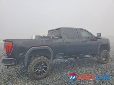 Trzecie zdjęcie samochodu z tyłu: 2020 GMC SIERRA K2500 DENALI VIN:1GT49REY7LF281127 - miniatura