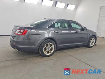 Trzecie zdjęcie samochodu z tyłu: 2017 FORD TAURUS SE VIN:1FAHP2D86HG100025 - miniatura