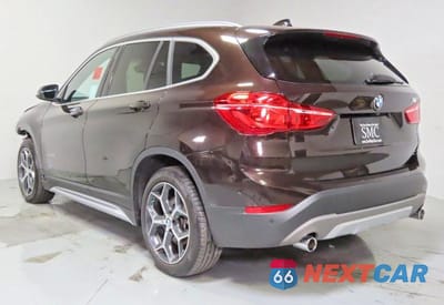 Czwarte zdjęcie samochodu z boku: 2018 BMW X1 SDRIVE28I VIN:WBXHU7C37J5L05511 - miniatura