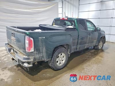 Trzecie zdjęcie samochodu z tyłu: 2015 GMC CANYON VIN:1GTH6AEA0F1241732 - miniatura
