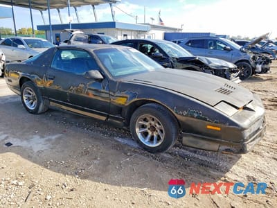 Czwarte zdjęcie samochodu z boku: 1985 PONTIAC FIREBIRD TRANS AM VIN:1G2FW87H8FL651696 - miniatura