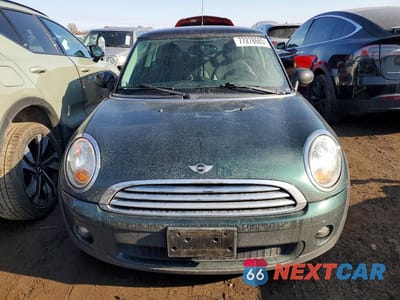 Piąte zdjęcie samochodu w środku: 2010 MINI COOPER VIN:WMWMF3C55ATZ65054 - miniatura