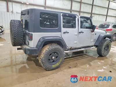 Trzecie zdjęcie samochodu z tyłu: 2010 JEEP WRANGLER UNLIMITED SPORT VIN:1J4BA3H13AL152479 - miniatura