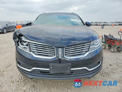 Piąte zdjęcie samochodu w środku: 2016 LINCOLN MKX PREMIERE VIN:2LMTJ6JR9GBL77249 - miniatura
