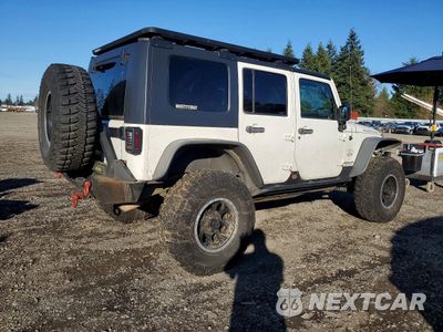 Trzecie zdjęcie samochodu z tyłu: 2010 JEEP WRANGLER UNLIMITED RUBICON VIN:1J4HA6H16AL119021 - miniatura