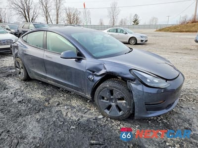 Czwarte zdjęcie samochodu z boku: 2023 TESLA MODEL 3 VIN:5YJ3E1EA3PF509260 - miniatura