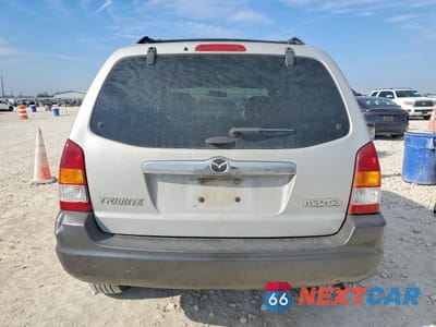 Zdjęcie 6 z 13 samochodu: 2003 MAZDA TRIBUTE VIN:4F2CZ06103KM32258 - miniatura