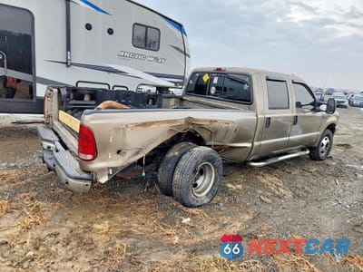 Trzecie zdjęcie samochodu z tyłu: 2002 FORD F350 SUPER DUTY VIN:1FTWW33F52ED47386 - miniatura