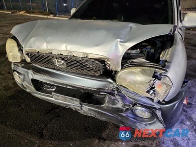 Zdjęcie 12 z 13 samochodu: 2004 HYUNDAI SANTA FE GLS VIN:KM8SC13E44U678838 - miniatura