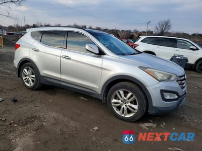 Czwarte zdjęcie samochodu z boku: 2014 HYUNDAI SANTA FE SPORT 2.0T VIN:5XYZW3LA2EG135610 - miniatura