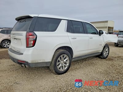 Trzecie zdjęcie samochodu z tyłu: 2022 CHEVROLET TAHOE K1500 PREMIER VIN:1GNSKSKL2NR157125 - miniatura