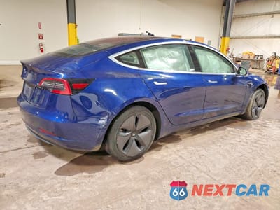 Trzecie zdjęcie samochodu z tyłu: 2018 TESLA MODEL 3 VIN:5YJ3E1EA6JF019578 - miniatura