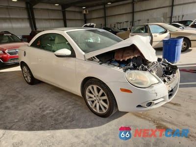 Czwarte zdjęcie samochodu z boku: 2011 VOLKSWAGEN EOS KOMFORT VIN:WVWBW7AH1BV002527 - miniatura