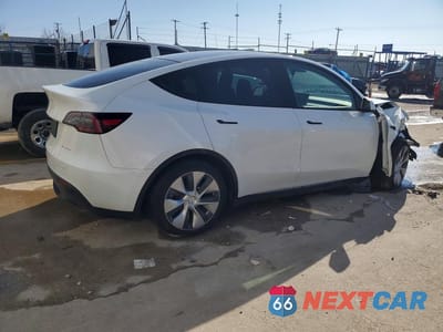 Trzecie zdjęcie samochodu z tyłu: 2023 TESLA MODEL Y VIN:7SAYGDEE0PF612059 - miniatura