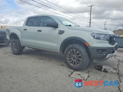 Czwarte zdjęcie samochodu z boku: 2021 FORD RANGER XL VIN:1FTER4EH6MLE00733 - miniatura
