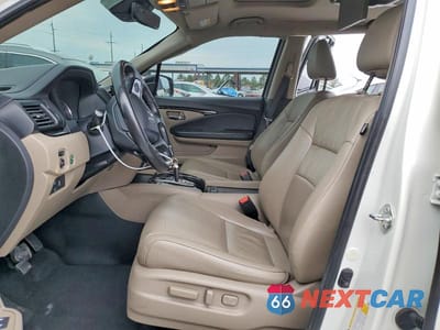 Zdjęcie 7 z 13 samochodu: 2019 HONDA PILOT TOURING VIN:5FNYF5H67KB002002 - miniatura