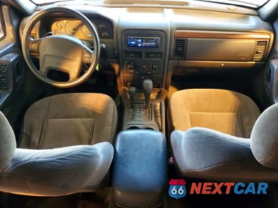 Zdjęcie 8 z 13 samochodu: 1999 JEEP GRAND CHEROKEE LAREDO VIN:1J4GW58S6XC508704 - miniatura