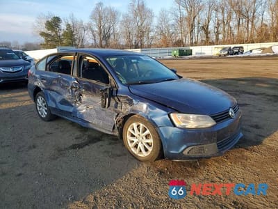 Czwarte zdjęcie samochodu z boku: 2012 VOLKSWAGEN JETTA VIN:3VWDP7AJ2CM452026 - miniatura