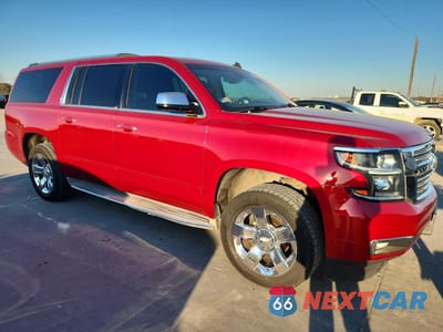 Czwarte zdjęcie samochodu z boku: 2015 CHEVROLET SUBURBAN C1500 LTZ VIN:1GNSCKKC2FR172254 - miniatura