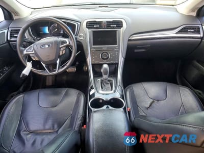 Zdjęcie 8 z 12 samochodu: 2014 FORD FUSION TITANIUM HEV VIN:3FA6P0RU5ER379103 - miniatura