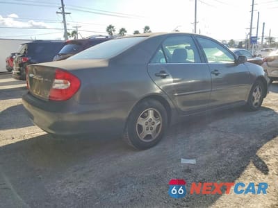 Trzecie zdjęcie samochodu z tyłu: 2002 TOYOTA CAMRY LE V6 VIN:4T1BF32KX2U535979 - miniatura