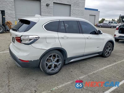 Trzecie zdjęcie samochodu z tyłu: 2017 BMW X1 XDRIVE28I VIN:WBXHT3C30H5F69002 - miniatura