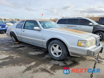 Czwarte zdjęcie samochodu z boku: 1984 LINCOLN MARK VII VIN:1MRBP98F5EY653009 - miniatura